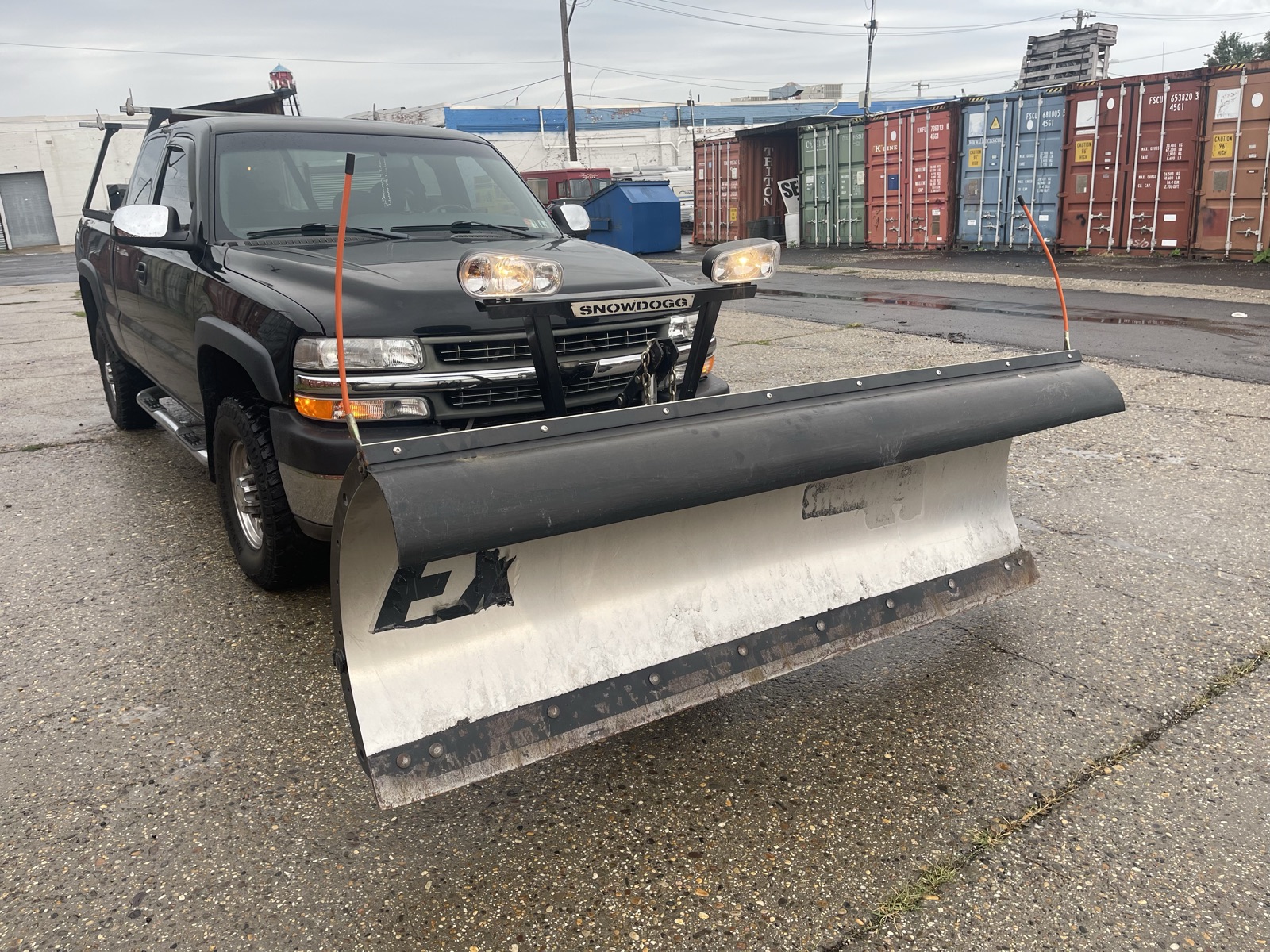JD Home Construction Chevy 2500HD plow truck with SnowDogg EX blade